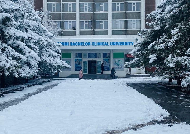 Building of Altamimi International University (signed Altamimi Bachelor Clinical University) in winter, Bishkek